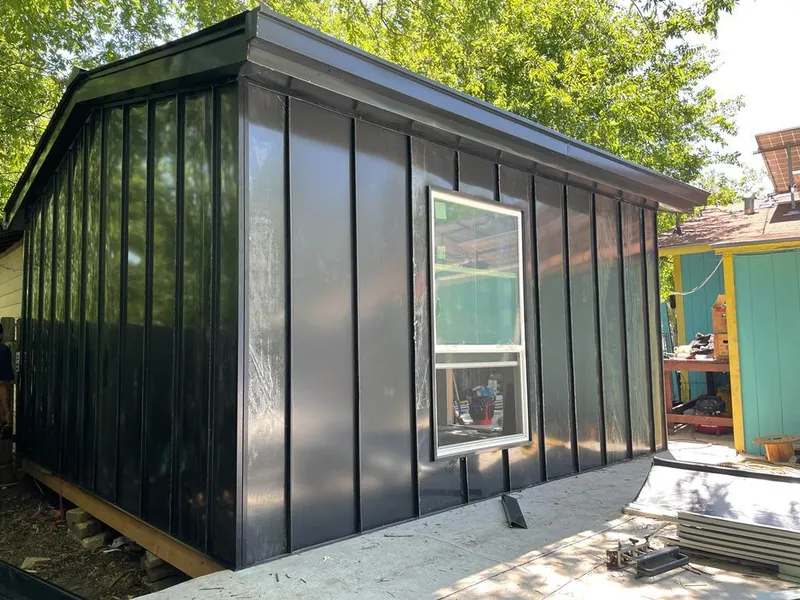 Black standing seam metal wall panels for Metal Roof Installation in Beekmantown