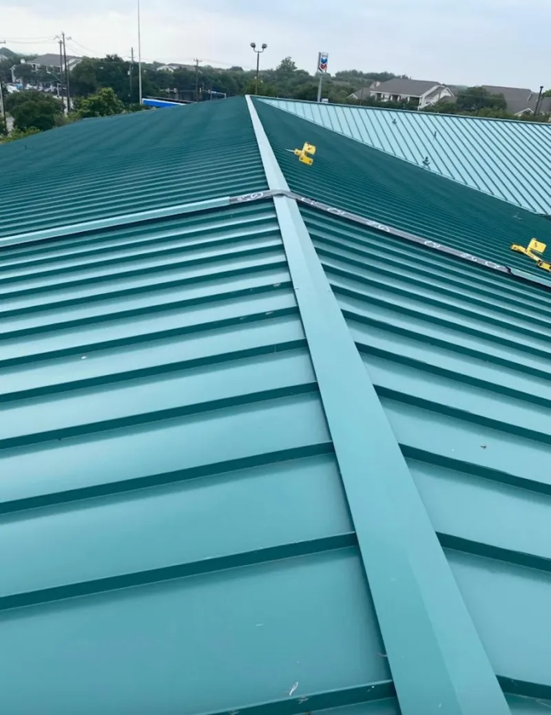 Green commercial metal roof ridge and valley for Metal Roof Repair in Beekmantown