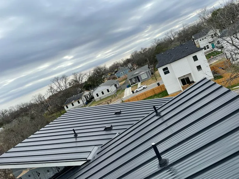 Standing seam metal roof panels with vents for Skylight Repair in Beekmantown